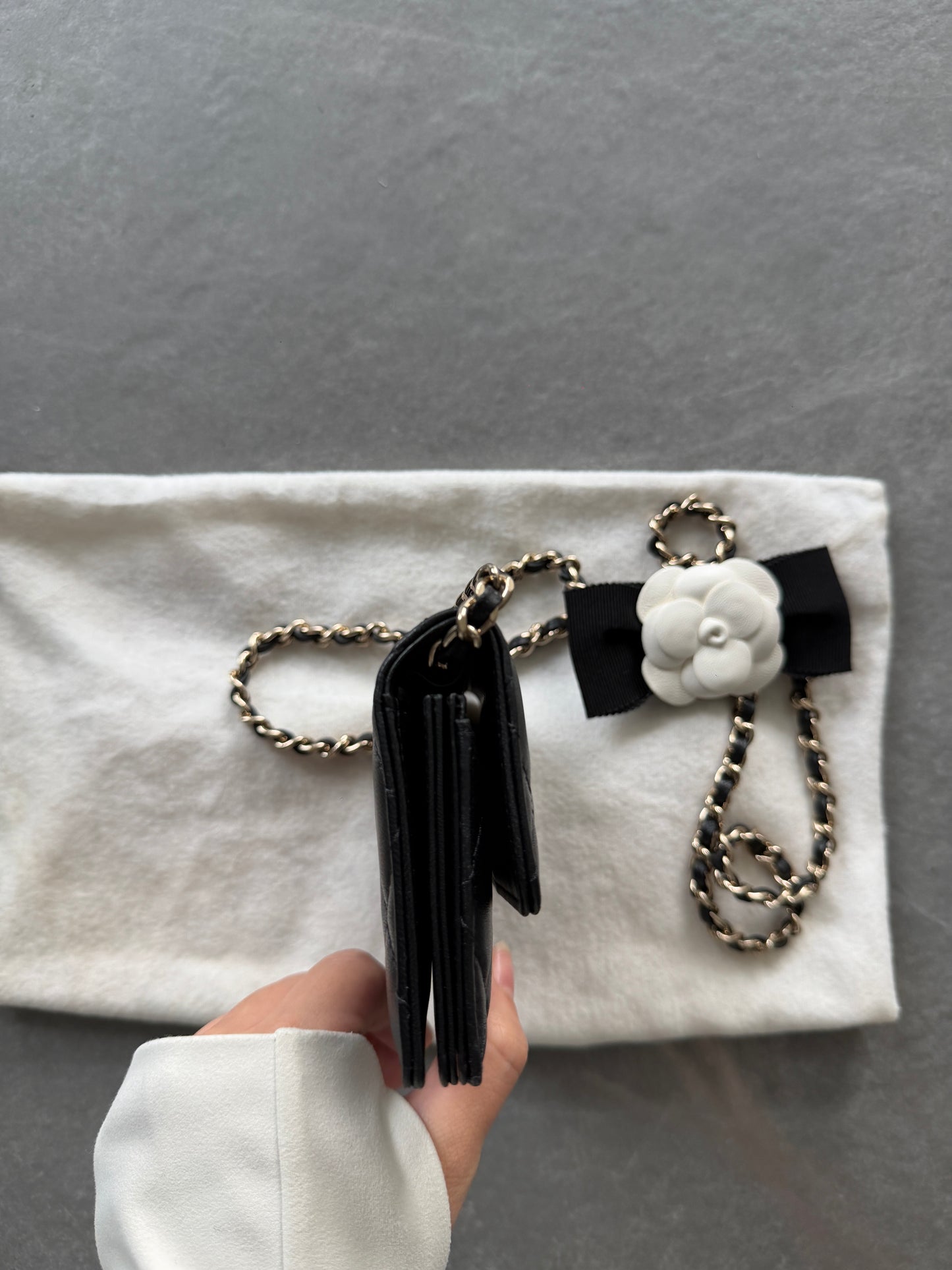 vintage Chanel black quilted lambskin card holder side view